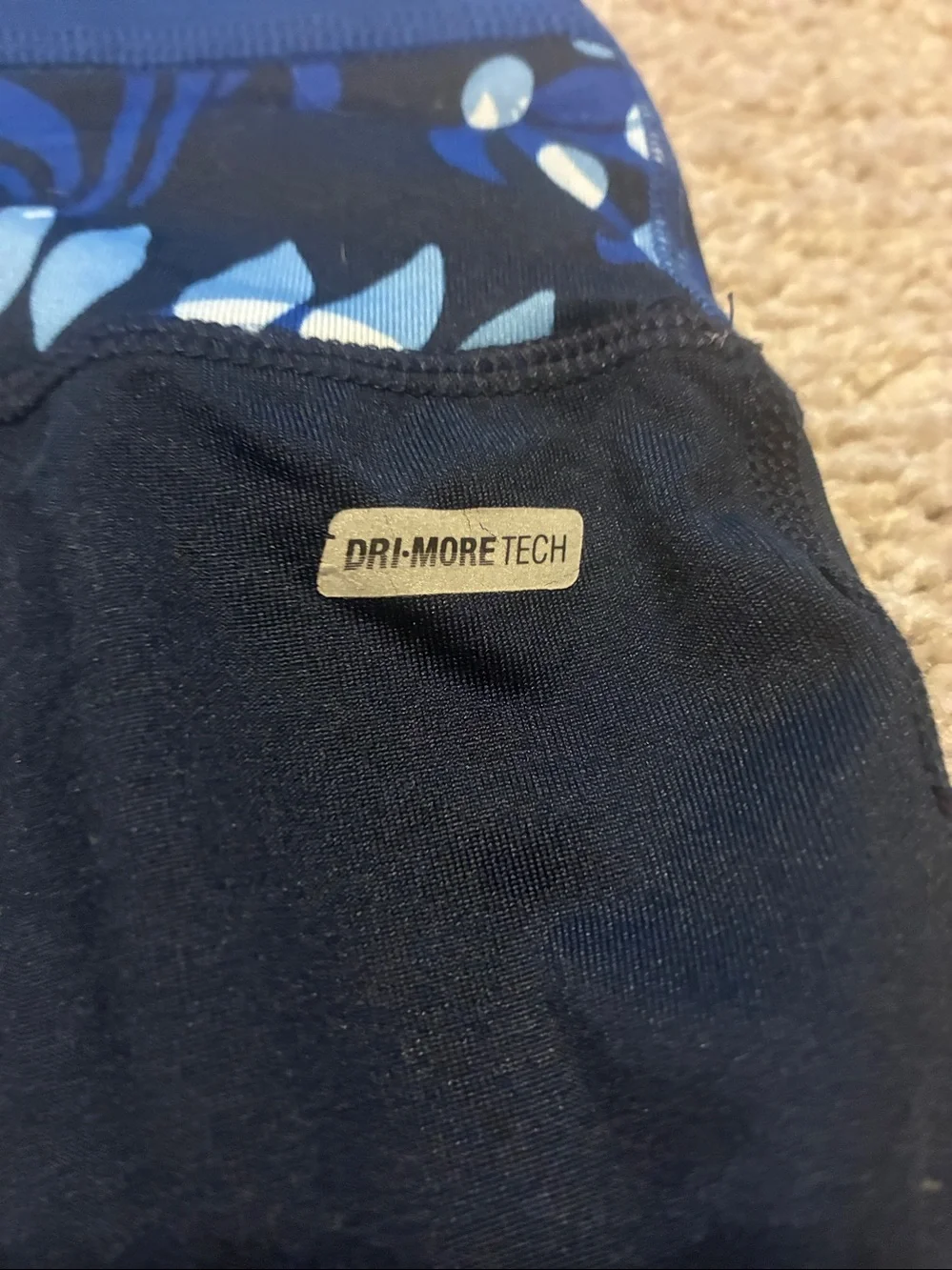Reversible Danskin Now Yoga Navy Capri Leggings with Blue Patterned Waistband